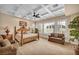 Spacious main bedroom boasts a trey ceiling, plantation shutters, and seating area at 1994 Orchard Mist St, Las Vegas, NV 89135