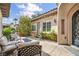 Inviting outdoor patio area with comfortable seating, perfect for enjoying the beautiful weather at 1994 Orchard Mist St, Las Vegas, NV 89135