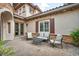 Relaxing outdoor patio area with comfortable seating perfect for entertaining or enjoying quiet moments at 1994 Orchard Mist St, Las Vegas, NV 89135