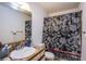 Functional bathroom with a floral shower curtain, standard toilet, and vanity at 2080 Karen Ave # 9, Las Vegas, NV 89169