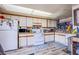 Functional kitchen equipped with essential appliances, ample counter space, and convenient storage solutions at 2080 Karen Ave # 9, Las Vegas, NV 89169
