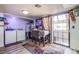 Combined dining and laundry area with a sliding door, appliances, and a table at 2080 Karen Ave # 9, Las Vegas, NV 89169