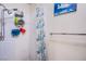 Simple shower with white tile, showerhead, and shelves for toiletries at 2080 Karen Ave # 9, Las Vegas, NV 89169