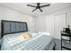 Comfortable bedroom with cozy bed and neutral finishes at 2127 Brewer Ave, North Las Vegas, NV 89081