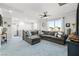 Spacious living room with a comfortable sectional sofa and plenty of natural light at 2127 Brewer Ave, North Las Vegas, NV 89081