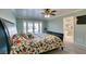 Comfortable bedroom with a bed, an ensuite bathroom, and access to a patio at 2246 Almart Cir, Henderson, NV 89014