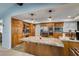 Charming kitchen with granite counters, oak cabinets, and stainless steel appliances at 2246 Almart Cir, Henderson, NV 89014