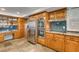 Charming kitchen featuring oak cabinets, stainless appliances and tiled backsplash at 2246 Almart Cir, Henderson, NV 89014