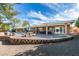 Expansive back yard with pool, patio and seating area with scenic backyard view at 2246 Almart Cir, Henderson, NV 89014