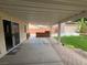 The back patio provides an inviting space for outdoor gatherings and relaxation at 228 Hiawatha Way, Mesquite, NV 89027