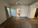 Large bedroom with neutral carpet, an ensuite bathroom, and large windows at 228 Hiawatha Way, Mesquite, NV 89027