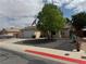 Inviting single story home with mature landscaping, two-car garage, and a spacious driveway at 228 Hiawatha Way, Mesquite, NV 89027