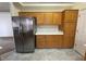 Spacious kitchen features stainless steel refrigerator and plenty of cabinet space at 228 Hiawatha Way, Mesquite, NV 89027