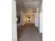 Open concept living space featuring plush carpet, neutral walls and abundant light at 228 Hiawatha Way, Mesquite, NV 89027