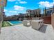 A spacious backyard featuring a built-in barbecue and patio area for outdoor gatherings at 253 Robledo St, Las Vegas, NV 89138