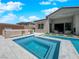 Backyard pool and spa with an outdoor bar perfect for entertaining guests at 253 Robledo St, Las Vegas, NV 89138