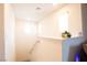 Upstairs hallway featuring natural light, neutral paint and cute decor at 2678 Weathered Copper Ave, North Las Vegas, NV 89086