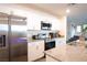 Bright kitchen with granite counters, stainless appliances, and a kitchen sink at 2678 Weathered Copper Ave, North Las Vegas, NV 89086