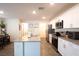 Bright kitchen with granite counters, stainless appliances, and a kitchen island at 2678 Weathered Copper Ave, North Las Vegas, NV 89086