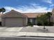 Charming single-story home featuring a two-car garage and desert landscaping for low water use and easy care at 2747 Sandalwood Ave, Henderson, NV 89074