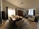 Open living and dining area perfect for entertaining with comfortable seating and stylish decor throughout at 2747 Sandalwood Ave, Henderson, NV 89074