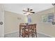 Cozy breakfast nook with wood table set, a ceiling fan, and natural light from windows at 2831 Geary Pl # 2918, Las Vegas, NV 89109