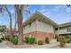 A multi-story building with brick accents, well-maintained landscaping, and a private walkway at 2831 Geary Pl # 2918, Las Vegas, NV 89109
