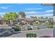 Exterior view of the building with mature trees, bushes and ample parking at 2831 Geary Pl # 2918, Las Vegas, NV 89109