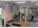 Community gym with weight machines and mirrored wall at 2831 Geary Pl # 2918, Las Vegas, NV 89109