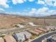 This aerial view showcases the surrounding desert landscape that enhances this quiet neighborhood at 2832 Aragon Terrace Way, Henderson, NV 89044