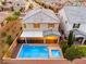 The aerial view captures the backyard oasis, featuring a pool and private space, perfect for outdoor enjoyment at 2832 Aragon Terrace Way, Henderson, NV 89044
