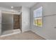 Bathroom with glass shower and window bringing in lots of natural light at 2832 Aragon Terrace Way, Henderson, NV 89044