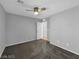 Bedroom with neutral carpet, modern ceiling fan, and a large closet at 2832 Aragon Terrace Way, Henderson, NV 89044