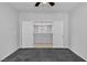 Bedroom showcasing double doors and stylish flooring at 2832 Aragon Terrace Way, Henderson, NV 89044