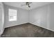 Bedroom featuring neutral carpet, a ceiling fan, and bright natural light at 2832 Aragon Terrace Way, Henderson, NV 89044