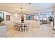 Dining room featuring tile floors and a modern chandelier at 2832 Aragon Terrace Way, Henderson, NV 89044