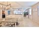 Dining room with tile floors that opens to the kitchen and living room at 2832 Aragon Terrace Way, Henderson, NV 89044