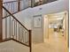 Open foyer with tile flooring, staircase, and access to living areas at 2832 Aragon Terrace Way, Henderson, NV 89044