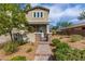 Home exterior with stone accents, a brick walkway, and a gated front entry at 2832 Aragon Terrace Way, Henderson, NV 89044