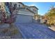 Beautiful two-story home featuring a brick driveway and attached garage at 2832 Aragon Terrace Way, Henderson, NV 89044