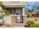 Covered front porch view showcasing desert landscaping and neighborhood street at 2832 Aragon Terrace Way, Henderson, NV 89044