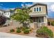 Charming home exterior with a manicured front yard, brick walkway, and a two-car garage at 2832 Aragon Terrace Way, Henderson, NV 89044