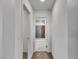Neutral hallway that leads to a bathroom with standing shower at 2832 Aragon Terrace Way, Henderson, NV 89044