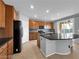 Kitchen featuring granite countertops, stainless steel appliances, and tile floors at 2832 Aragon Terrace Way, Henderson, NV 89044