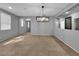 Bright living room featuring recessed lights, tile floors, and gray walls at 2832 Aragon Terrace Way, Henderson, NV 89044