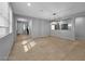 Open-concept living room with tile flooring and ample natural light at 2832 Aragon Terrace Way, Henderson, NV 89044