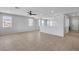 Open-concept living room with natural light and tile flooring at 2832 Aragon Terrace Way, Henderson, NV 89044