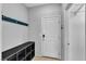 Functional mud room with coat hooks, bench, and storage at 2832 Aragon Terrace Way, Henderson, NV 89044