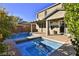 Beautiful backyard with a sparkling pool, spa, and covered patio at 2832 Aragon Terrace Way, Henderson, NV 89044