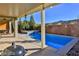 Backyard with a pool, spa, and covered patio at 2832 Aragon Terrace Way, Henderson, NV 89044